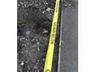 Caution gas main below tape.