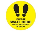 Please wait here until next spot is clear sign