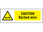 Caution Barbed wire safety sign.