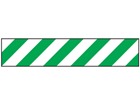 Laminated warning tape, green and white chevron.