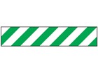 Laminated warning tape, green and white chevron.