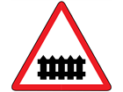 Level crossing with barrier or gate ahead sign