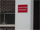 Concealed entrance sign