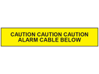 Caution alarm cable below tape.