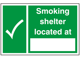 Smoking shelter located at sign