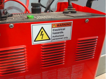 Electrical hazards. Authorised personnel only label