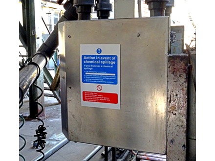 Chemical spill action notice safety sign.