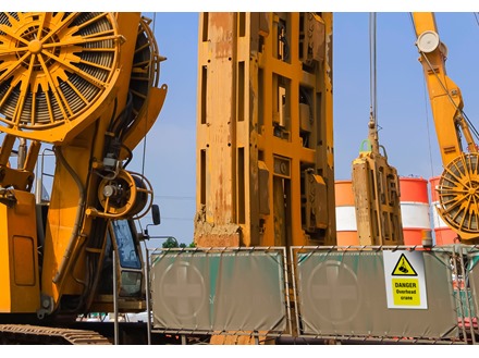 Danger, Overhead crane symbol and text safety sign.