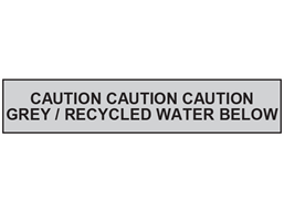 Caution grey or recycled water below tape.