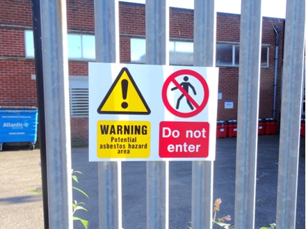 Warning Potential asbestos hazard area, Do not enter safety sign.