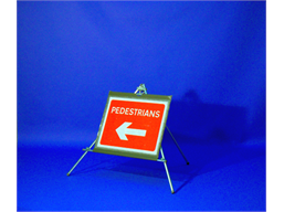 Pedestrians (arrow left) roll up road sign