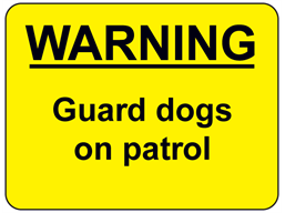 Warning Guard dogs on patrol sign