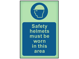 Safety helmets must be worn in this area photoluminescent safety sign