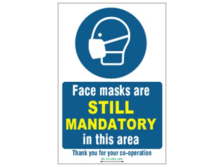 Face masks are still mandatory in this area safety sign.
