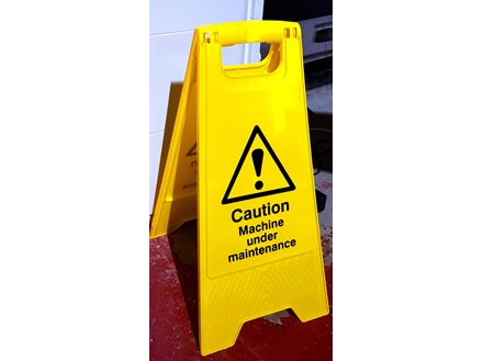 A-board, caution machine under maintenance