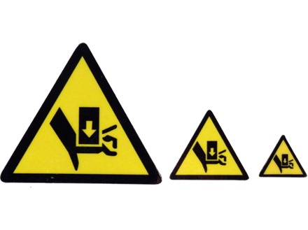 Crush hazard warning symbol label.