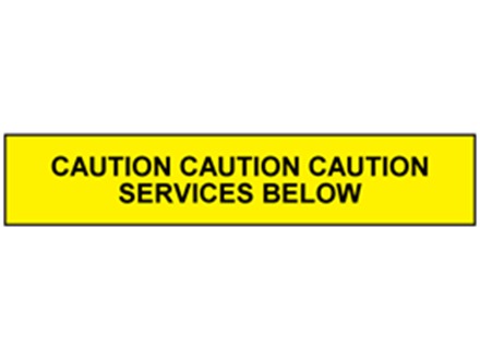 Caution services below tape.