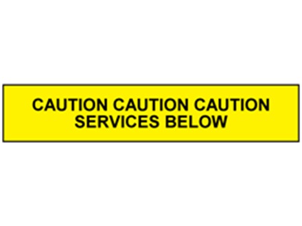 Caution services below tape.