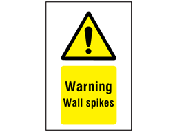 Warning wall spikes symbol and text sign.
