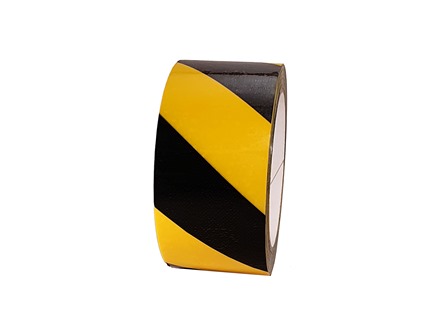 Laminated warning tape, black and yellow chevron.