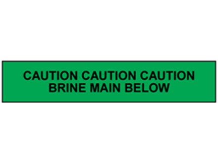 Caution brine main below tape.