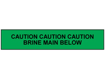 Caution brine main below tape.