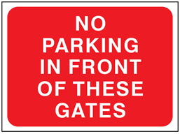 No parking in front of these gates temporary road sign.