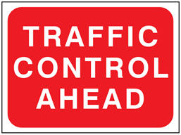 Traffic control ahead temporary road sign.