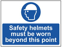 Safety helmets must be worn beyond this point sign