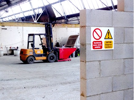 Unauthorised access strictly prohibited, Caution dangerous machinery safety sign.