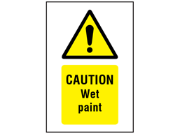 Caution Wet paint symbol and text safety sign.